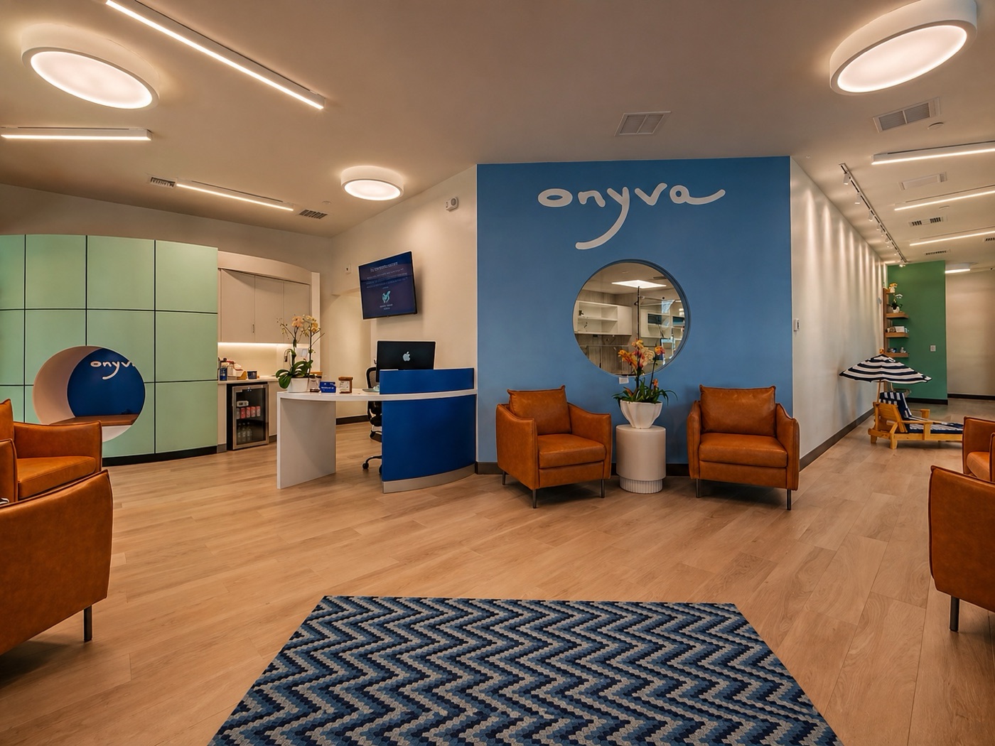 Onyva dog grooming franchise lobby with round LED ceiling fixtures and a branded reception wall
